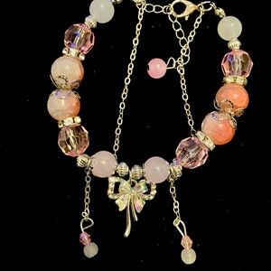 Pink and white fairy bracelet with a touch of whimsy 
Length 16cm/6.3in
